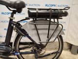 a bike with a basket attached to the back of it
