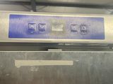 an image of a close up of a machine in a warehouse