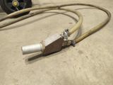 a hose connected to a water hose on the floor