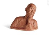 statue d'un vieil homme, la main posée sur le menton