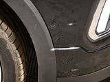 a close up view of a car ' s front tire