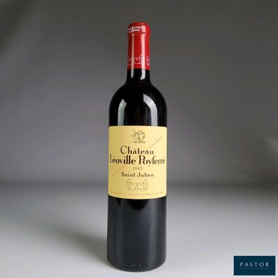 a bottle of wine that is sitting on a table