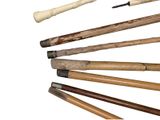a lot of different types of wood sticks on a white background