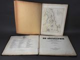 an open book with a map on it sitting on top of a table