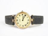 une image d'une montre-bracelet avec des chiffres romains