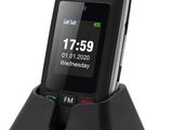 an image of a cell phone sitting on top of a charging dock