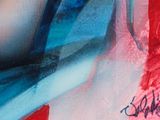 painting of a woman ' s face on a wall with a red background