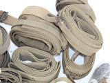a lot of belts that are laying on the ground