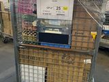 a cart that has a lot of boxes in it