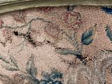 an image of a close up of a chair with a floral design on it