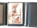 a black wallet with a card holder inside of it