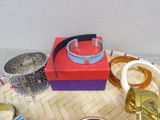 a tray with a variety of glass items on top of it