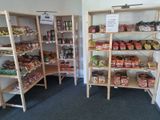 many shelves of food and snacks in this room