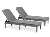 a pair of loungers with grey cushions on a white background