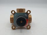 a close up of a brass plated valve on a white surface