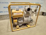 a small pump that is sitting on the ground