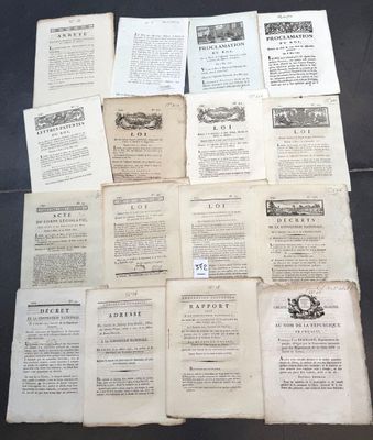 a lot of old papers that are on a table