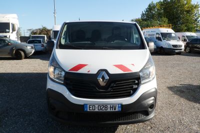 a white van that is parked in a parking lot