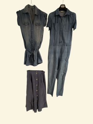 three pieces of clothing that are hanging on a hanger
