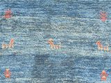 an area rug with a blue and red design on it