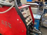 a machine that is sitting on a table in a factory