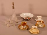 a table with a lot of cups and saucers on it