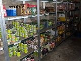 many cans of food on the shelves in the store