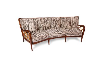 an image of a couch with a wooden frame and upholstered cushions