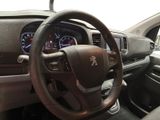dashboard of a car with steering wheel and dashboard controls