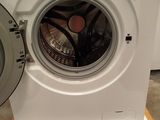 a washing machine that is sitting on a pallet