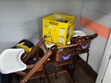 a baby changing table with a box and a chair