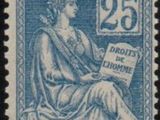 a stamp with the image of a woman holding a book