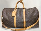 Sac Keepall Louis Vuitton en toile Monogram et cuir