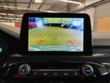 a picture of a car ' s rear view camera in the dash