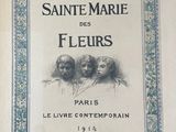 un vieux livre avec, sur la couverture, l'image de deux femmes
