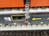 a picture of a close up of a truck with a hose attached to the front of it