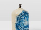 pair of blue and white vases sitting on top of a white table