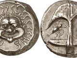 a silver coin with an image of a man on it