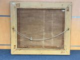 a picture of a wooden frame with a wire hanging from it