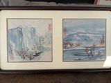 two framed pictures of mountains and trees on display