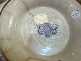 a white plate with a blue design on it