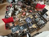 a lot of assorted items sitting on the floor