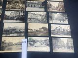 a lot of old black and white pictures on the wall