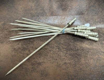 a bunch of sticks that have been placed on top of a table