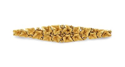 bracelet en pigne plaqué or avec des perles dorées