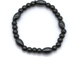 a black beaded bracelet on a white background
