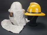 a close up of a fireman ' s helmet and protective gear