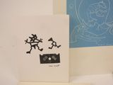 a picture of a couple of greetings on a table