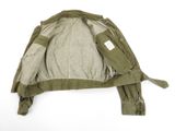 the back of a military jacket with a small patch on it