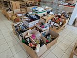 many boxes of assorted items on the floor